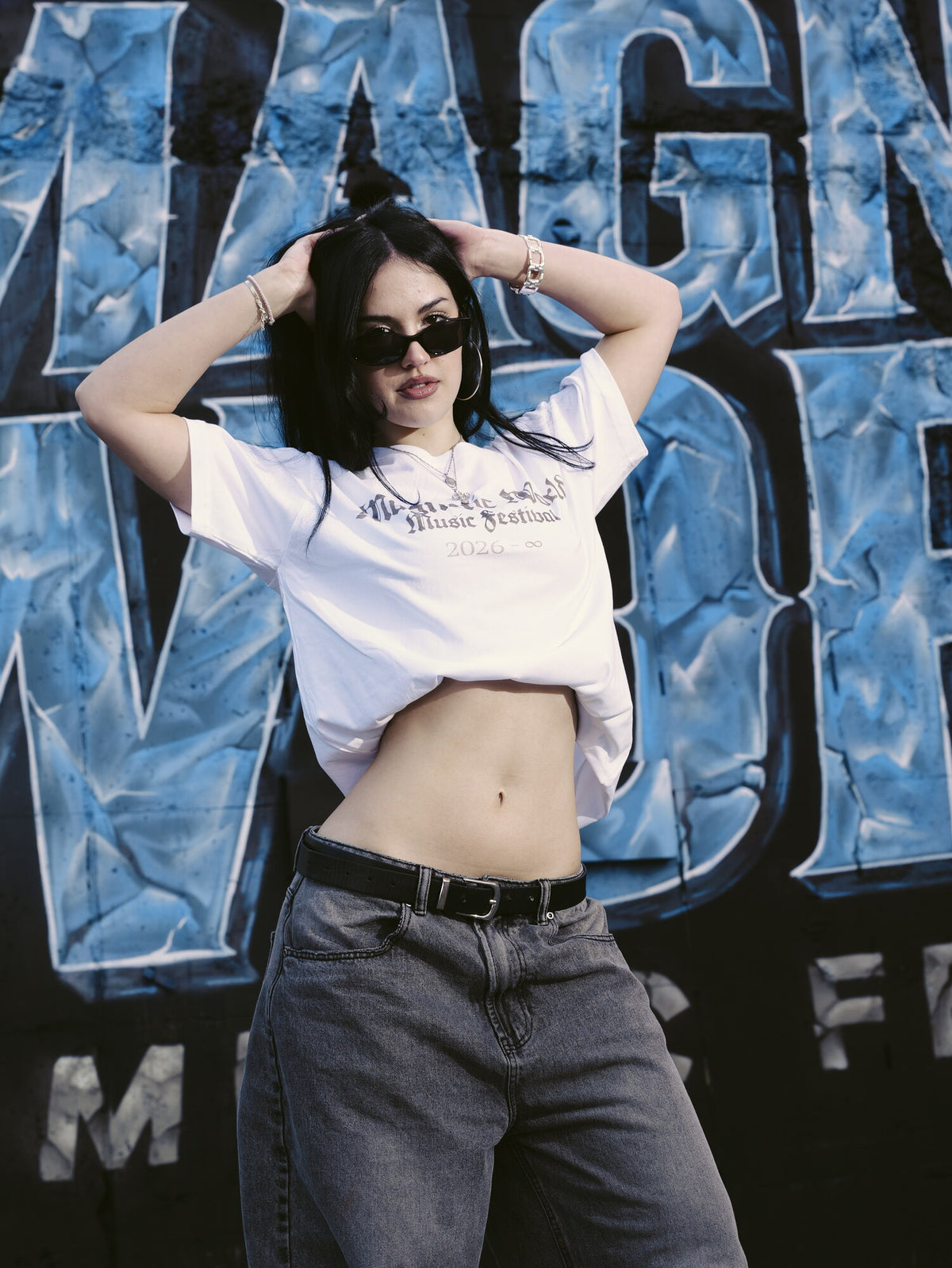 DaVinci Tee worn, front, at the festival mural